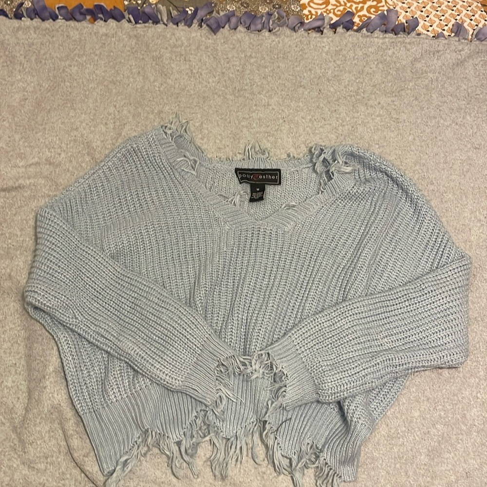 Blue tattered sweater
